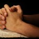 man's praying hands